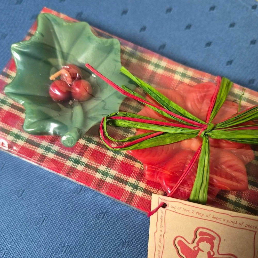 Bath & Body Works Christmas floating candles in holly leaf and poinsettia shapes